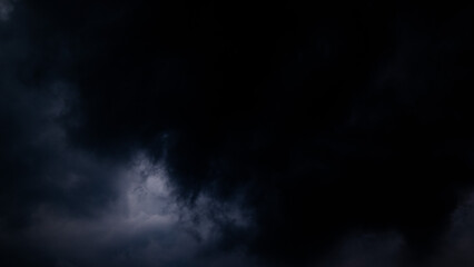 Wall Mural - dark sky with stormy clouds. dramatic sky rain,dark clouds before a thunder-storm.