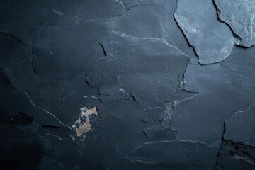 Poster - Close up of a dark textured surface with peeling layers revealing a subtle speckled pattern and variations in color and light creating a feeling of age and wear