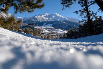 Aufkleber - Snowy mountain landscape with sunlight shining through trees and snow on the ground creating a bright and cold atmosphere