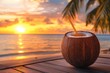© Julia - Sipping a fresh coconut drink while watching the sunset at a tropical beach