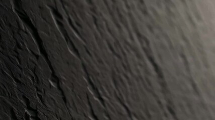 Poster - Abstract closeup of textured vertical columns with moving shadows