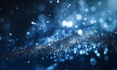 Abstract blue bokeh background with glowing particles, simulating a starry night or galaxy.