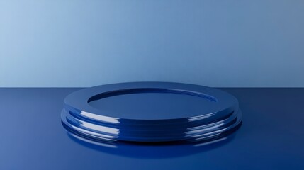 Aufkleber - Blue glossy platform on reflective surface against blue wall.