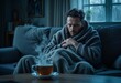 © GenAI Creations - Sick Man with Fever Wrapped in Blanket Holding Hot Drink on Sofa