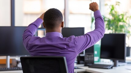 Poster - Man in purple shirt celebrating success at his desk surrounded by computer monitors in office