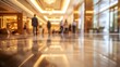 © Blur Bokeh - Blurred high-end hotel lobby with guests walking in the background