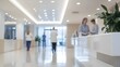 © Nanthawat - Blurred modern hospital lobby with medical staff in the background