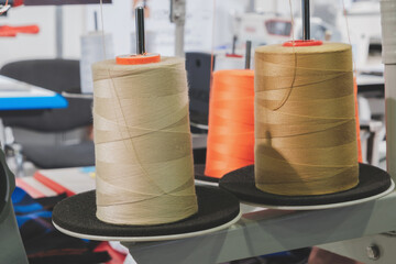 Poster - Industrial machine for embroidery of multi-colored threads on fabric