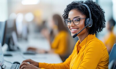 Poster - Smiling African American woman with a headset is working at a busy call center, ready to assist.
