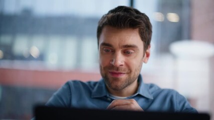 Poster - Smiling freelancer browsing website at laptop on apartment workplace closeup