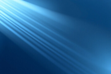 Canvas Print - bright beams of light diagonally illuminate a deep blue background, creating a sense of depth and et