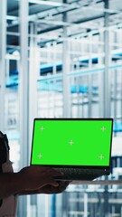 Poster - vertical video engineer using green screen laptop in industry 4.0 industrial plant to install machin