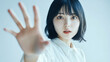 © shiro - STOP注意を呼びかける女性