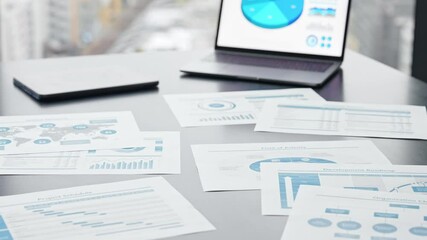 Poster - Documents and laptop on a table in an urban office