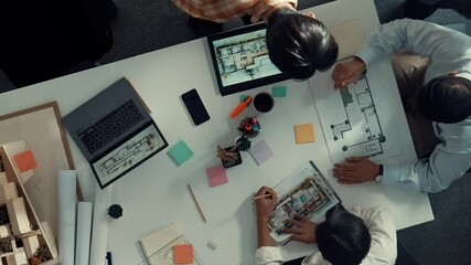 Poster - architect team discussing and pointing and presenting blueprint to interior designer. aerial view pr