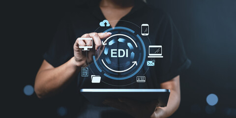 Aufkleber - Businesswoman using EDI technology on a tablet in a digital environment.