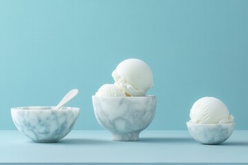 Fototapete - Creamy vanilla ice cream served in elegant marble bowls against a soft blue background