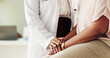 © peopleimages.com - Healthcare, patient and doctor with holding hands for support, kindness and empathy for cancer disease. People, client and medical employee with sorry for diagnosis, courage and illness in closeup