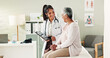 © peopleimages.com - Mature patient, doctor and tablet for healthcare, support or conversation with checkup appointment in office. Female person, medical professional and diagnosis talk for senior woman at clinic