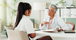 © peopleimages.com - Appointment, clipboard or medical with doctor and patient in hospital office for consulting. Conversation, documents or healthcare with mature medicine professional and woman in clinic for insurance