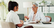 © peopleimages.com - Appointment, clipboard or healthcare with doctor and patient in office of hospital for consulting. Conversation, insurance or medical with mature medicine professional and woman in clinic for update