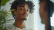 © Tri - Confident young man gazing at his reflection, embodying self-assurance and style