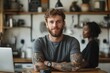 © Pixel Array - View over shoulder employer listen applicant at job interview online use cam and pc. Young caucasian man with tattoos at home working and talking online with African woman colleague in