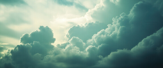 Wall Mural - The sky is filled with clouds and the sun is shining through them