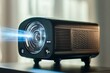© Dimas - Modern projector displaying bright light beam for home entertainment and cinema experience