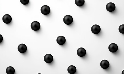 Poster - Matte black spheres arranged in a repeating pattern create a modern and minimalist visual texture.