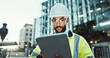 © peopleimages.com - Tablet, civil engineer and man in city for construction, development and planning at dawn. Technology, building and architect outdoor for maintenance, safety inspection and infrastructure project