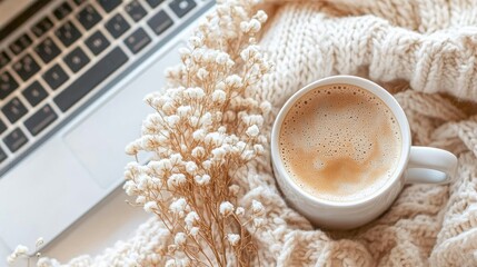 Poster - Cozy workspace setup with a laptop, coffee, and natural light on a kitchen table in the morning
