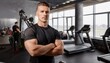 © Stefan Schurr - Confident fitness instructor posing in modern gym