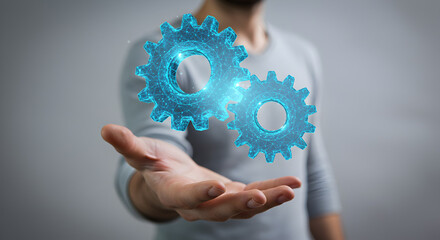 Poster - man presenting futuristic blue gears in hand representing engineering technology and artificial inte
