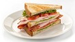 © Tipapat - Top view of a single club sandwich on a pure