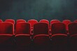© jechm - Empty red cinema seats waiting for spectators in dark theater