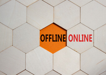 offline or online symbol. concept word offline or online on wooden comb puzzle. beautiful orange bac