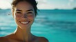 © LensDreamer - Timeless beauty in a tropical haven: A womana??s glowing skin and serene smile contrast with the vibrant blues of the ocean embodying relaxation and effortless elegance. q2