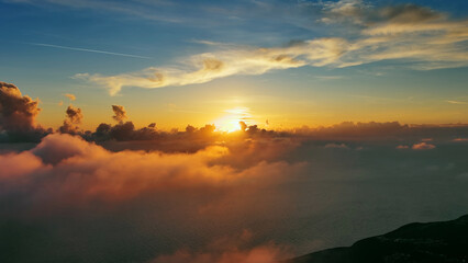 Wall Mural - aerial view of bright sunset clouds