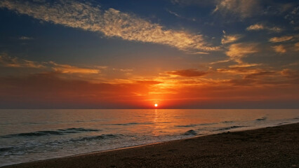 Wall Mural - sunset over sea with vibrant colors