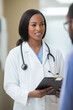 © Mselected - Healthcare professional conducts patient consultation in a clinic setting
