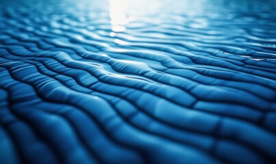 Poster - Abstract waves of cool blue water glisten and ripple in sunlight, creating a serene atmosphere.