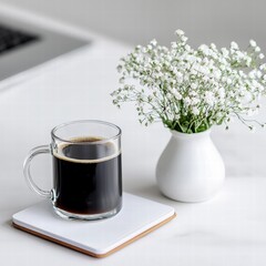 Poster - Cozy workspace featuring a cup of coffee next to a laptop on a wooden table with a relaxed ambiance