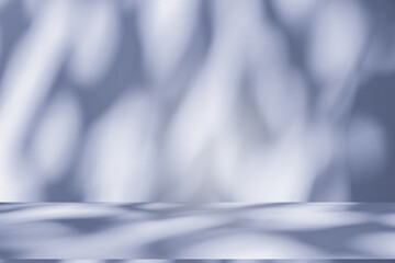 Poster - Wall interior background, studio and backdrops show products. with soft light shadow from window color blue and white. background for text insertion and presentation of product	
