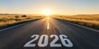 © Dmitriy - A long open road disappearing into the distance with '2026' ahead representing new beginnings, personal growth and an exciting journey to success.