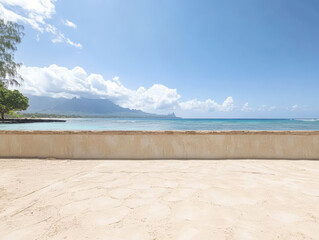 Fototapete - Beautiful beach view with mountains and clear skies in the distance during sunny daytime