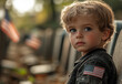 © Nadюshes  - A boy on the background of an American military cemetery. USA Memorial Day.