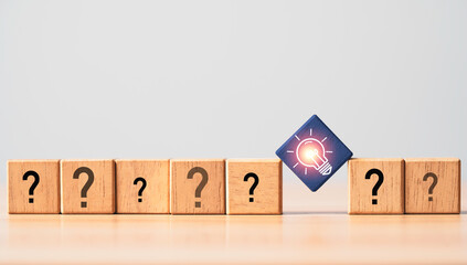 Poster - Glowing light bulb among question mark for focus and concentrate of creative thinking idea and problem solving concept.
