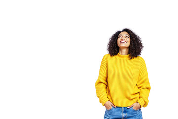 Poster - Cheerful woman in yellow sweater looking up, standing casually with hands in pockets, isolated on white background, concept of happiness. Ai generative