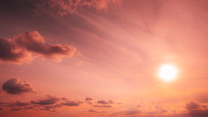 Wall Mural - Sunset Time Lapse Time-lapse In Yellow, Orange Colors. Sunrays In Dramatic Sky. Sunset Sky Natural Background. 4k Sunset Cloudy Sky With Fluffy Clouds. Saturated Yellow Colors Of Sky Clouds